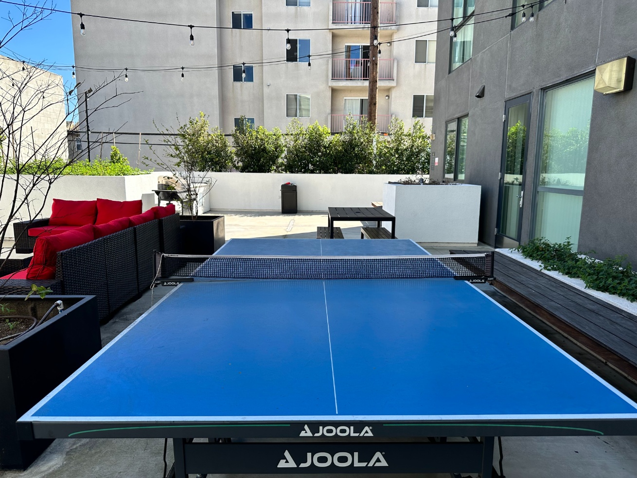 Ping pong table in the zen deck courtyard at Heritage 1275