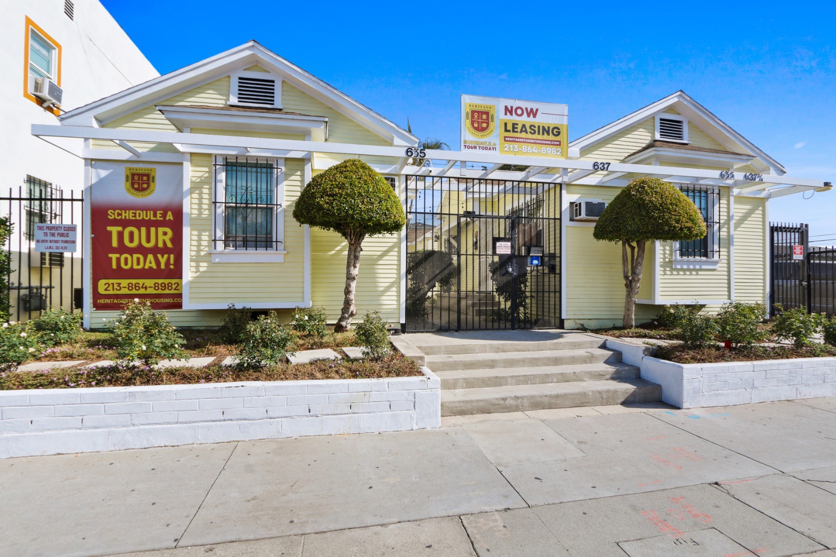 Sidewalk and exterior of the Bungalows at Heritage 631